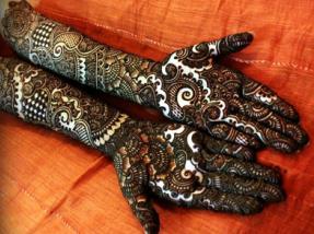 mehandi designs on bridal hands on wedding by makeup artist chennai