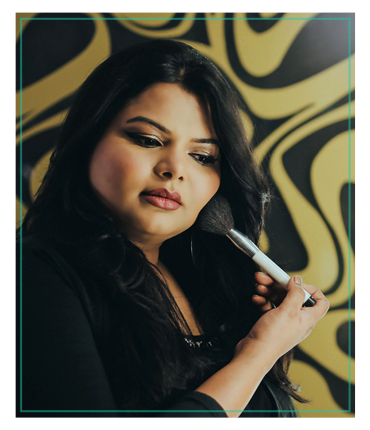 Image-make Portrait of professional makeup artist of Skulpt academy with makeup brush